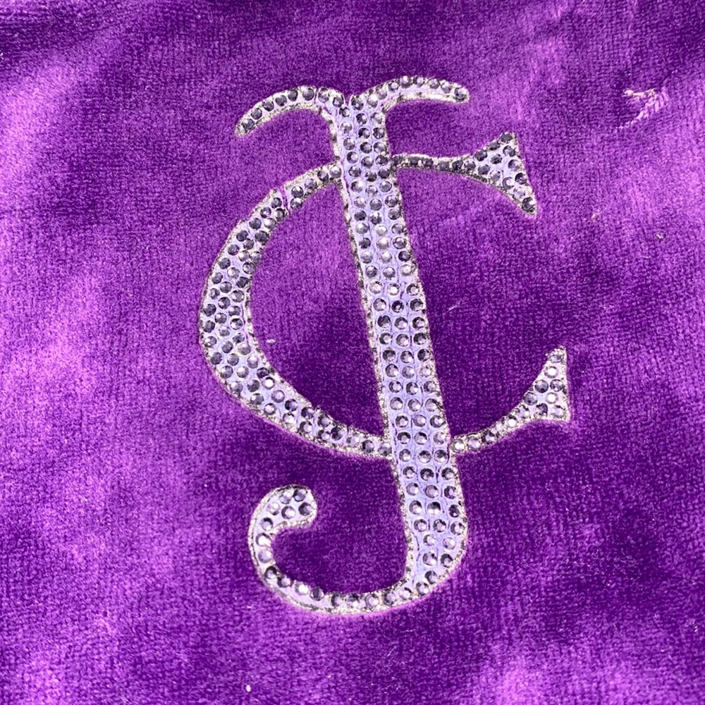 Purple sweatpants.